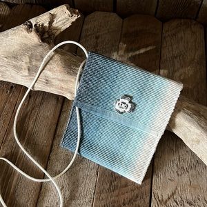 Three pocket crossbody purse